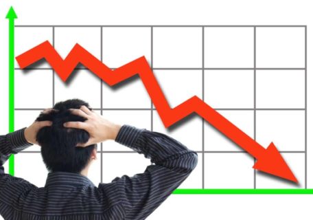 stressed investor looking at bear market